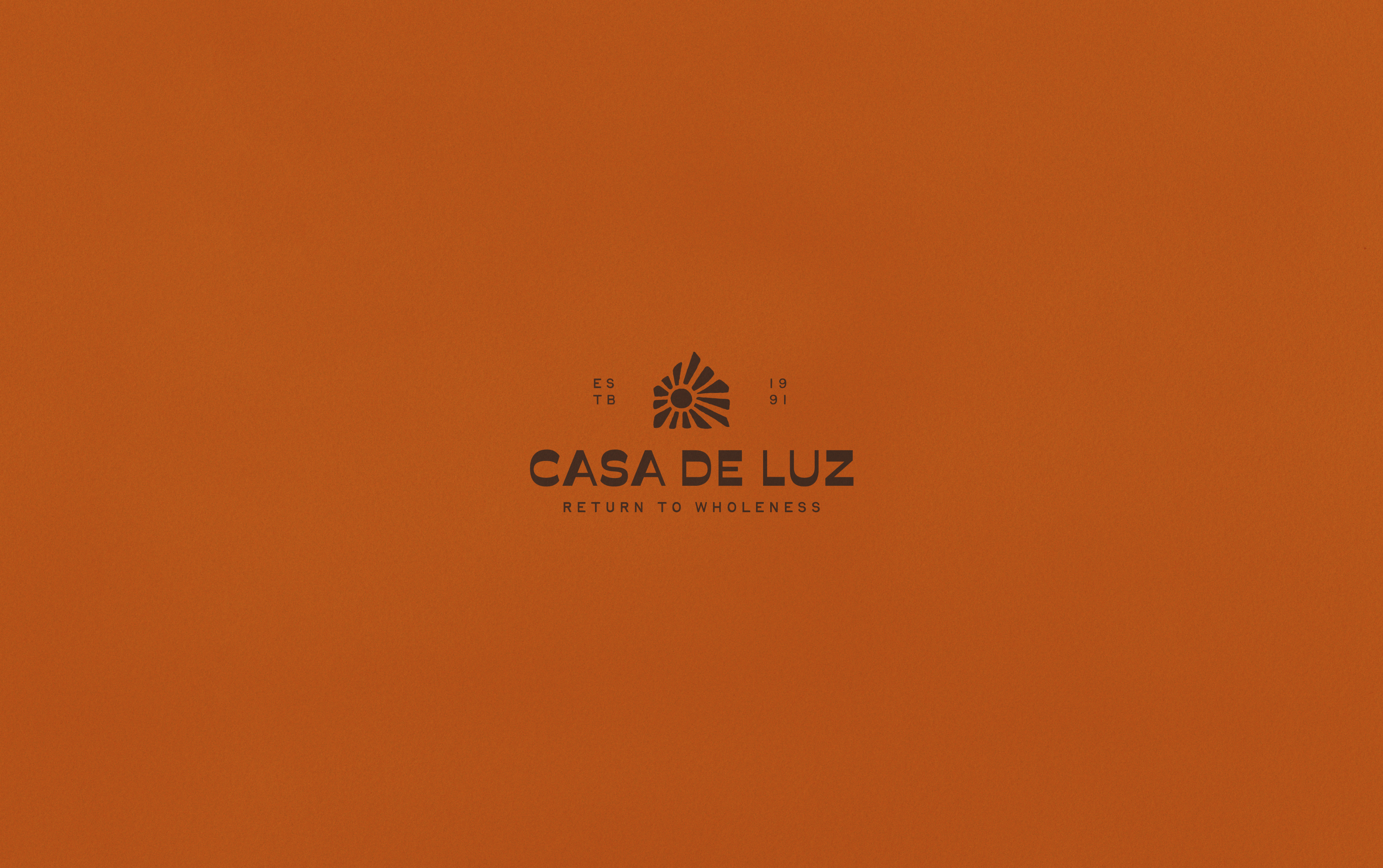 Anders brand wordmark in white placed on top of an image of a modern interior design.